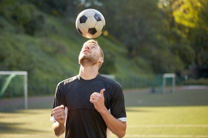 man playing football